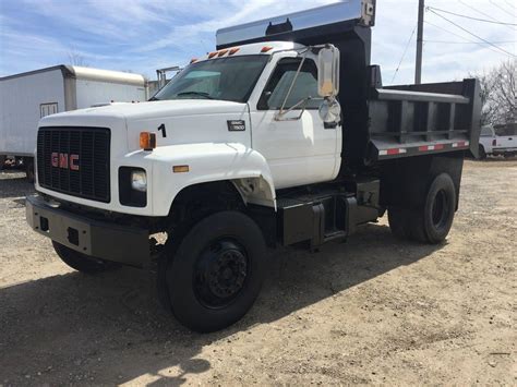 Air Conditioning 1998 GMC Topkick C7500; Engine 3116; Engine Make Cat; Engine HP 170; Transmission Manual; Diesel; Front Axle 8100; Rear Axle 21000; GVWR 27340; WB 188; 6 Spd; 14&x27; metal bottom stake bed that dumps. . 1998 gmc c7500 curb weight
